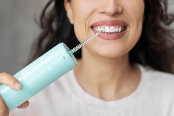 Dental Floss vs Water Flosser